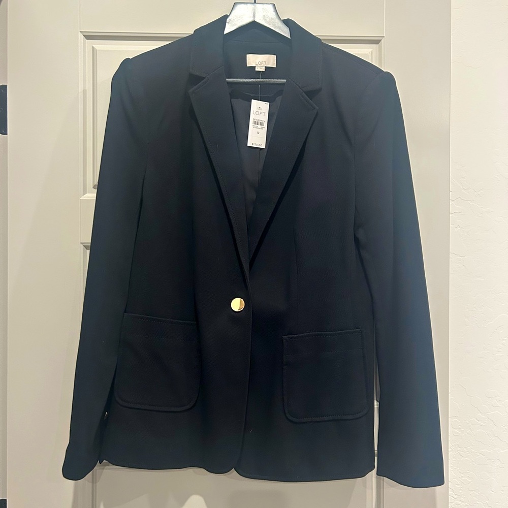 Black blazer with gold button detail